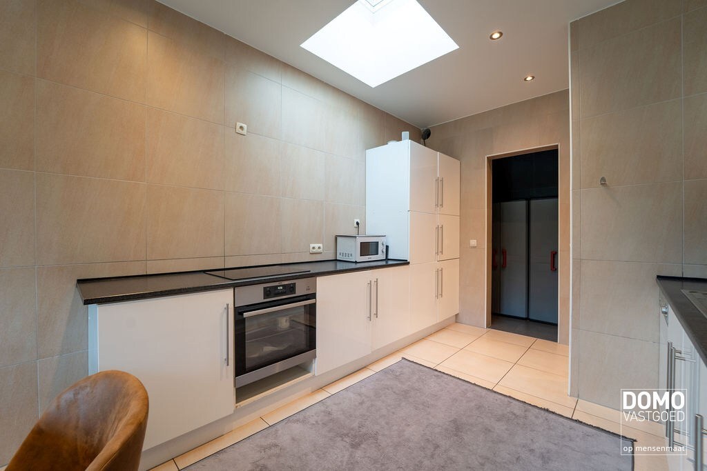 Gunstig gelegen handelshuis te Spalbeek (Hasselt) 