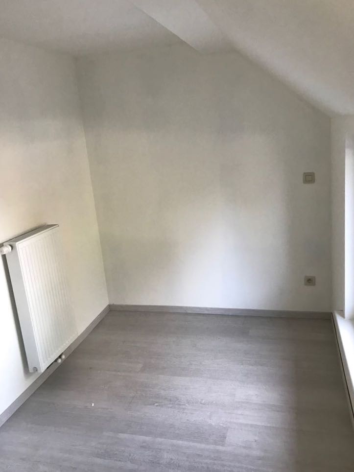 Instapklare eengezinswoning met aangelegde tuin in centrum Temse 