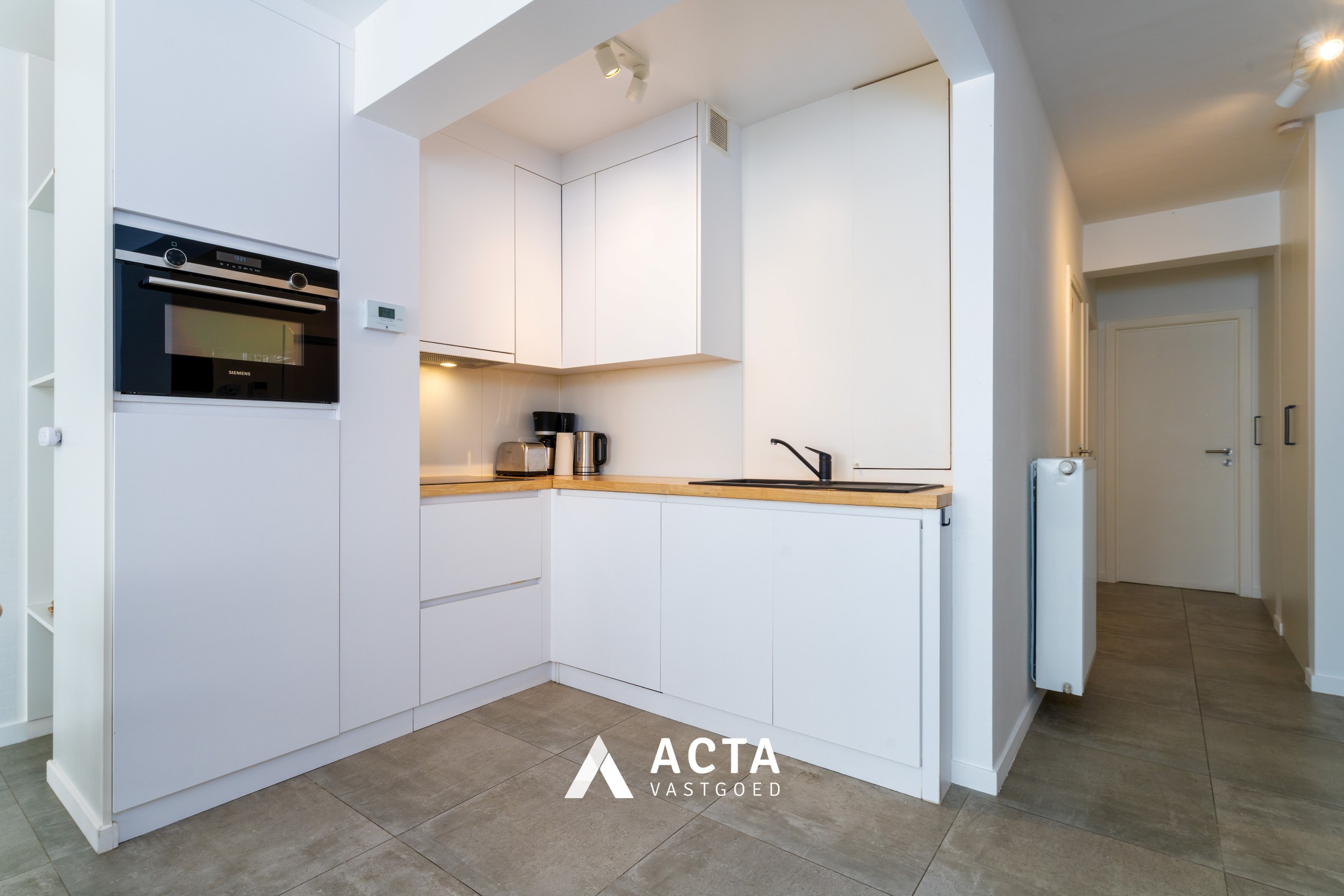 Gerenoveerd appartement met 2 terras in centrum 