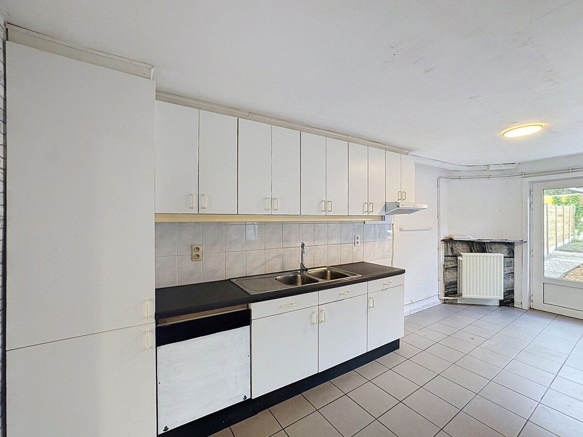 Praktische woning met 3 slaapkamers en tuin in centrum Zomergem 
