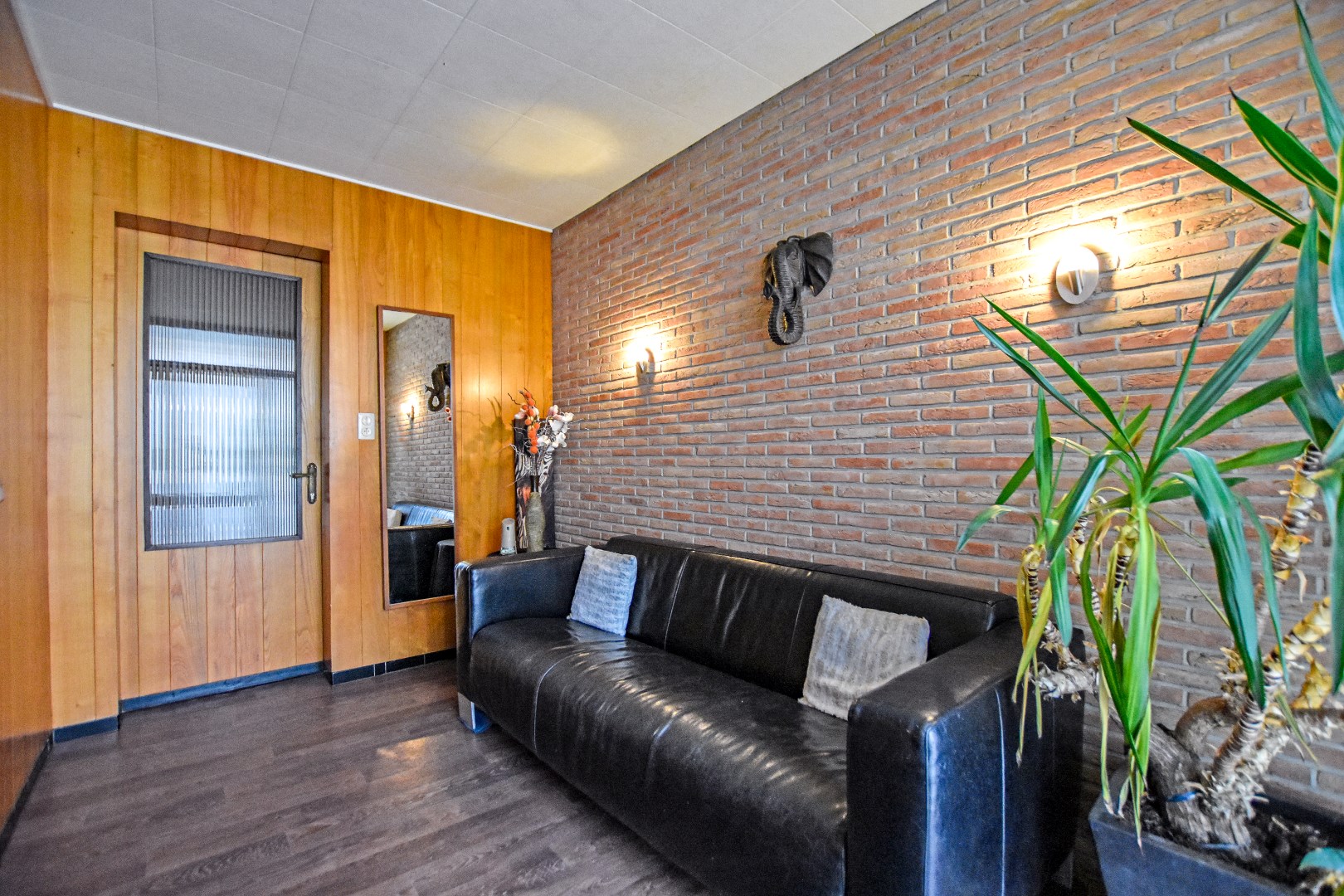 Grote woning met zongerichte tuin en 3/4 slaapkamers 