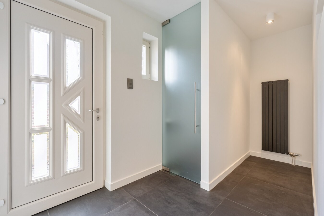 Gezellige, instapklare stadswoning in het centrum van Maaseik grenzend aan de groene wal! 