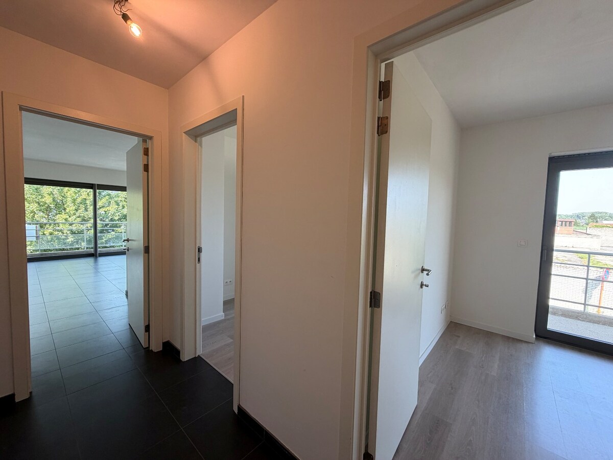 2 slpk-appartement nabij allerhande voorzieningen. 