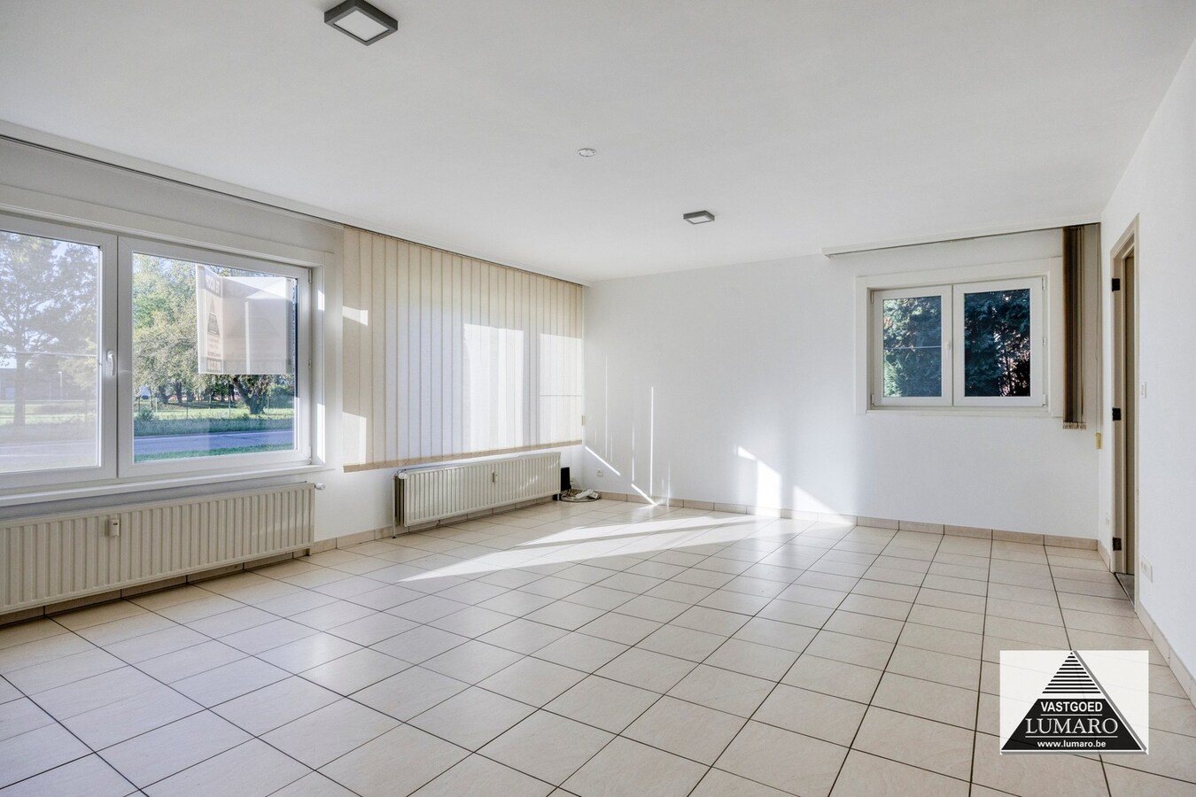 Gelijkvloers appartement met 3 slaapkamers, en ruime garage 