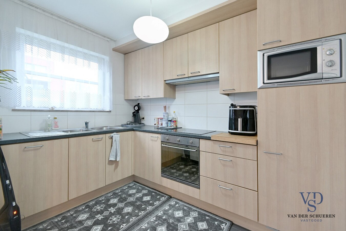 3 slpk-appartement (+ terras + kelder + garage). 