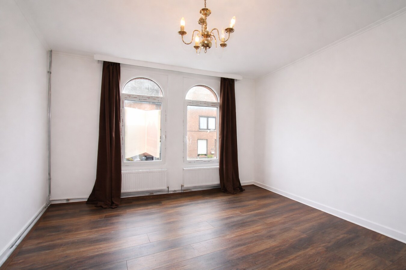 Te koop: Centraal gelegen woning met twee slaapkamers, zolderverdieping, EPC label C én tuin in Sint-Niklaas! 