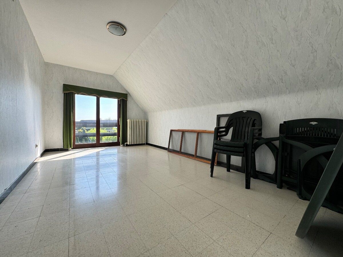 Alleenstaande woning met 4 slaapkamers en garage te Westende 