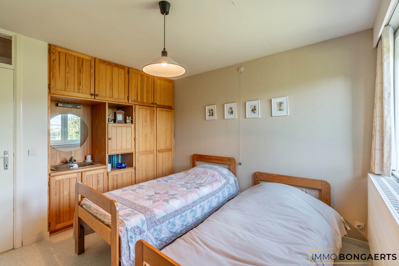 Ruime woning met 4 slaapkamers, tuin en garage in Opglabbeek. 