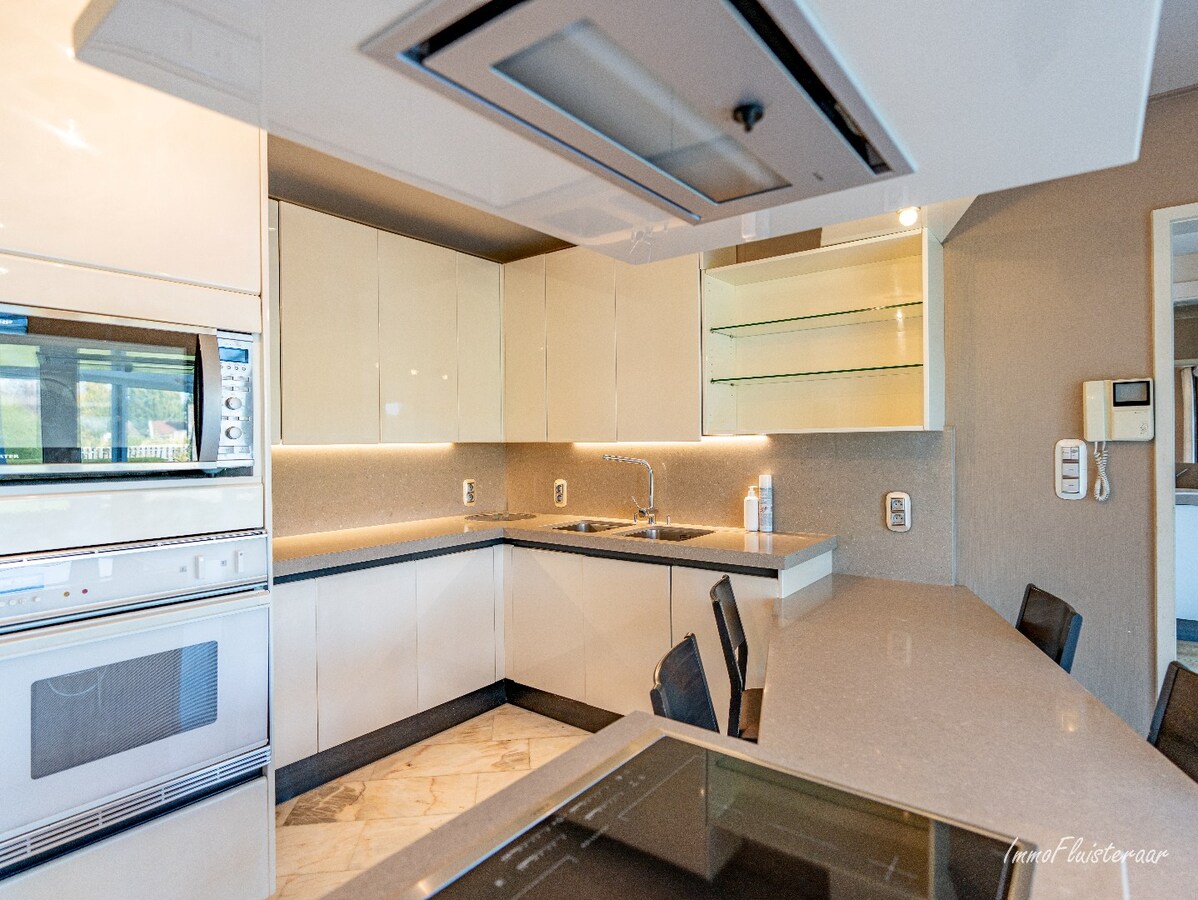 Rural villa with multifunctional outbuilding on approximately 51 acres in Bilzen 