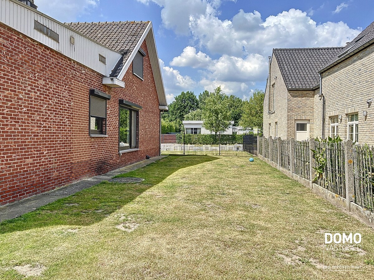 Gerenoveerde open bebouwing met tuin gelegen te Hasselt 