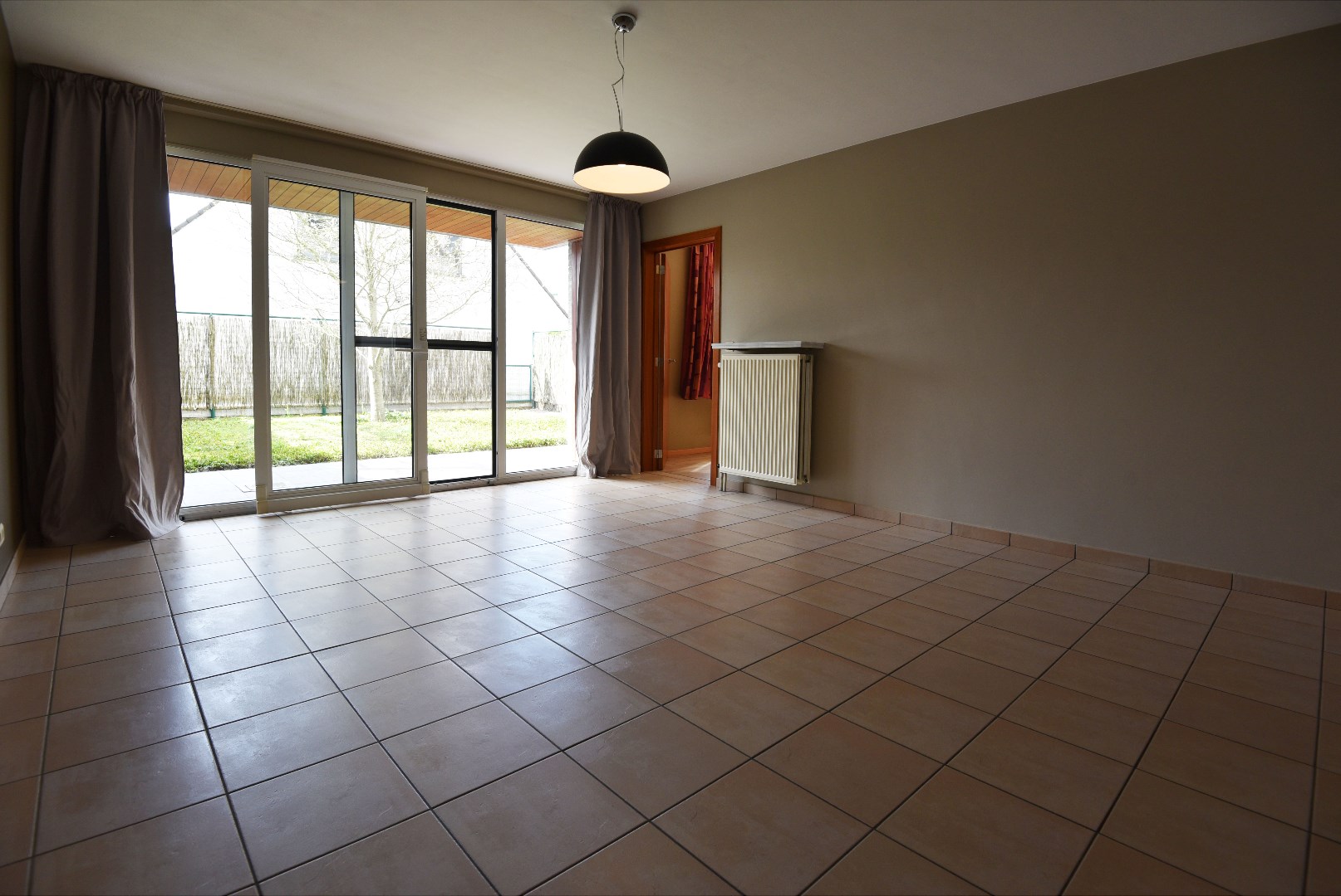 Gelijkvloers appartement met tuin en garage te Kaprijke 