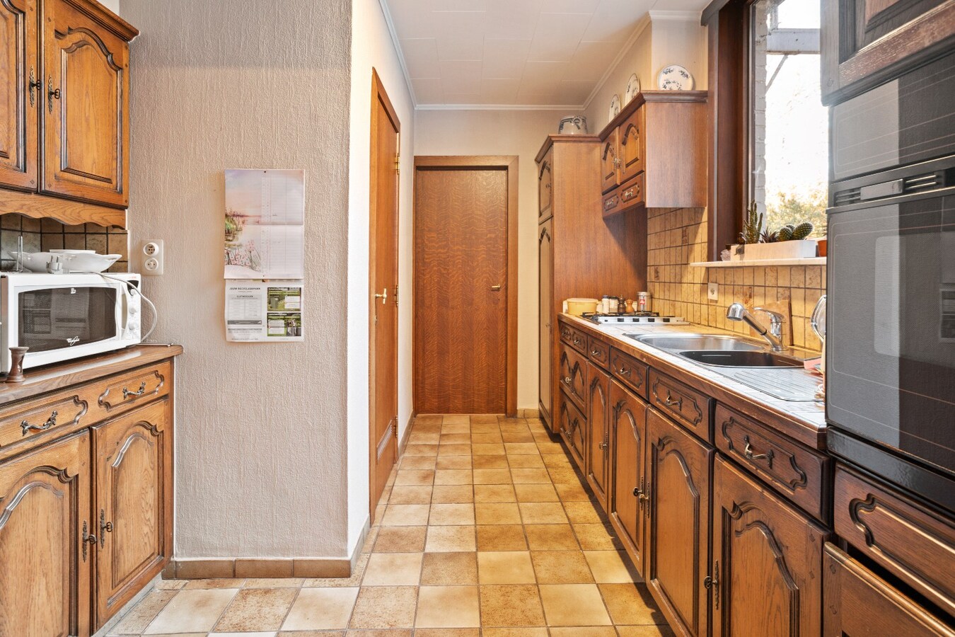 Ruim, voormalig handelshuis in het Centrum van Dadizele 