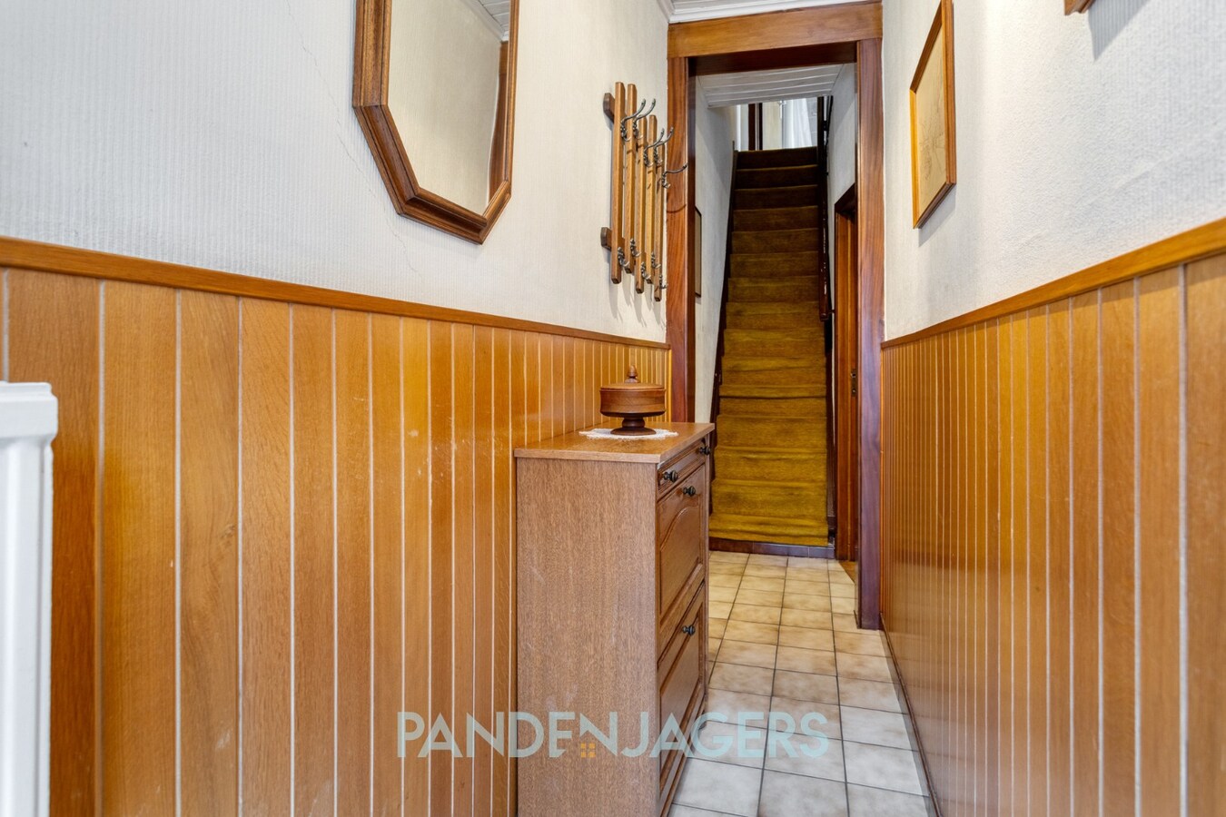 Te renoveren woning met zonnige tuin in hartje Duffel-Oost 