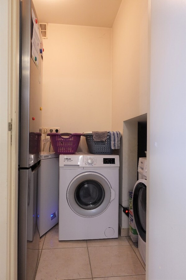 Gezellig gelijkvloersappartement met zonnige tuin en garage 