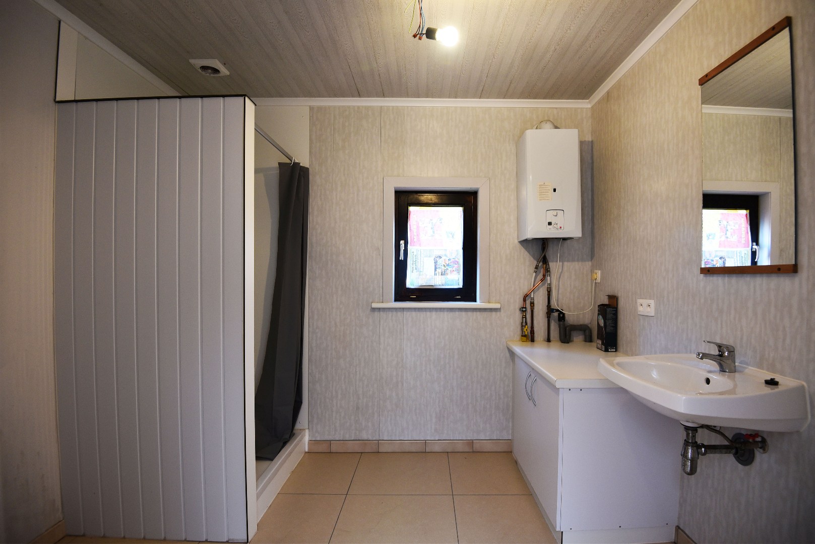 Rijwoning met 2 slaapkamers en tuintje te Eeklo 
