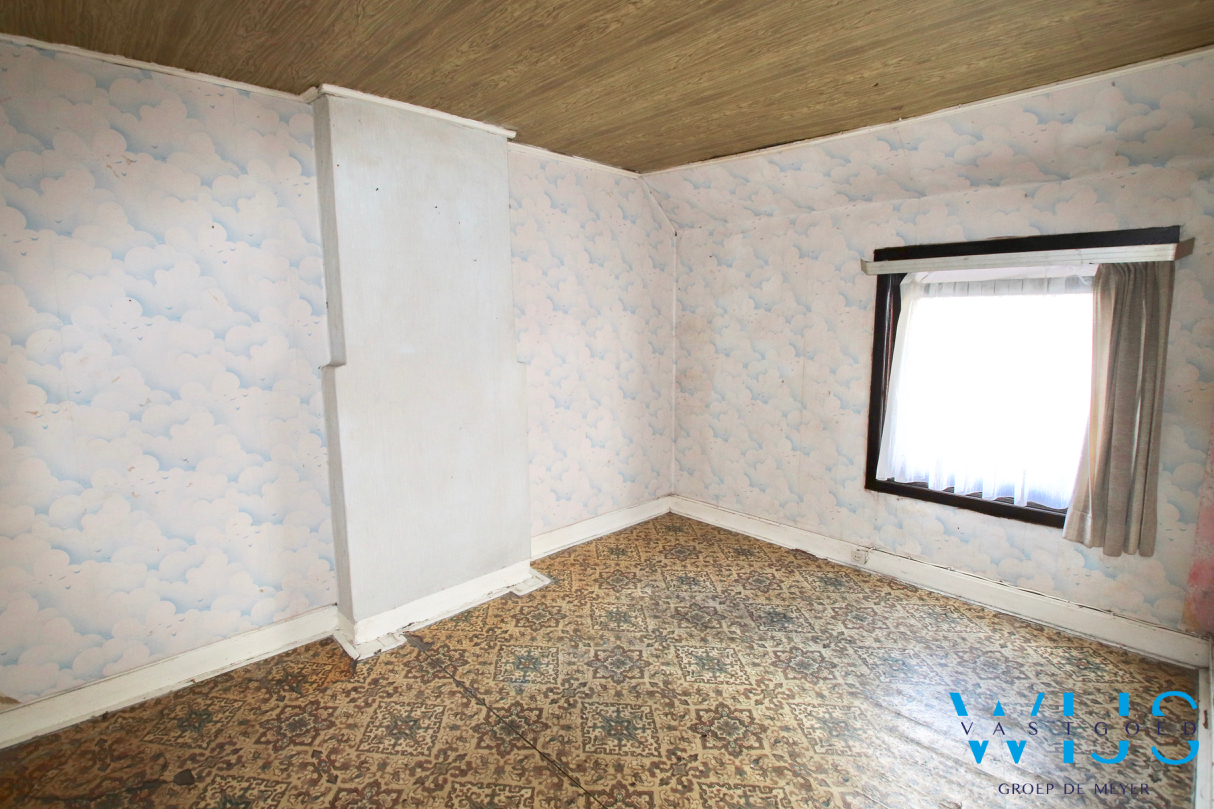 Op te frissen woonhuis op een mooi perceel te Ertvelde ! 