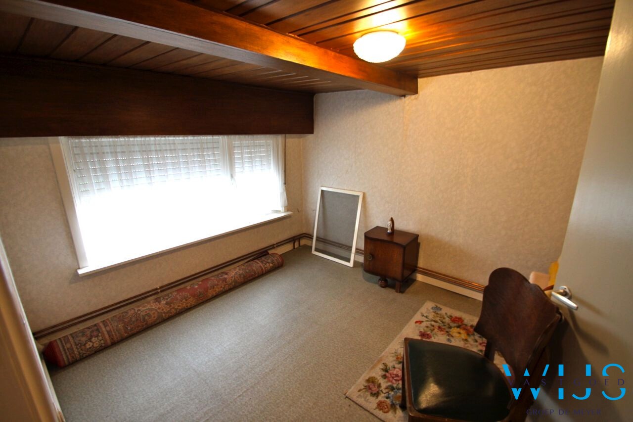 Centraal gelegen woning met mooie grond te Ertvelde! 