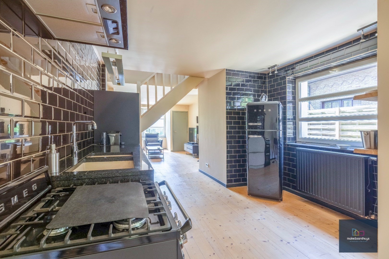 Halfopen bebouwing met zuidertuin en parkeergelegenheid nabij centrum Destelbergen 