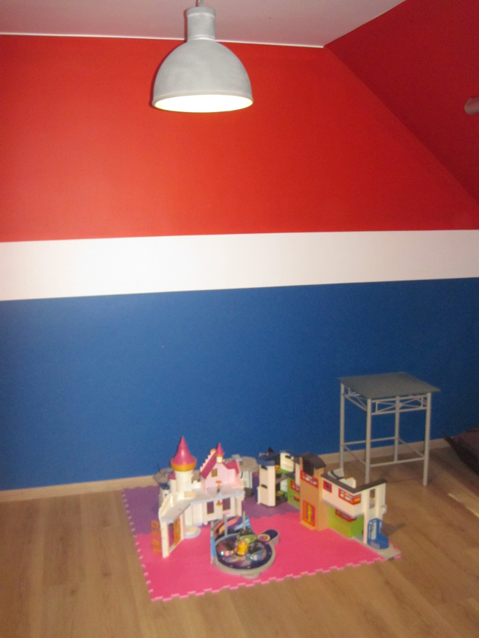 Recent vernieuwde rijwoning nabij de Schelde. 