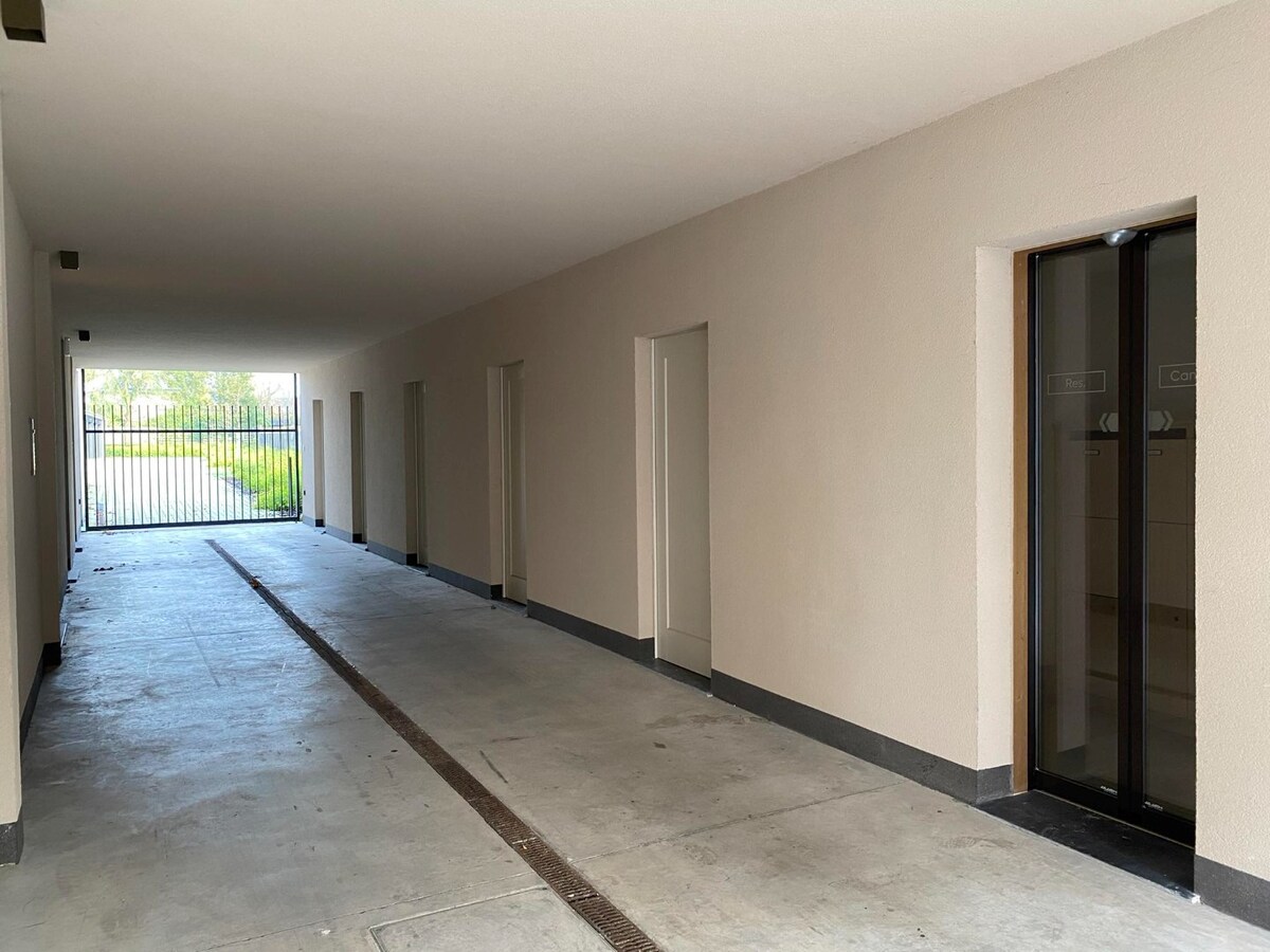 Gelijkvloersappartement met 3 slaapkamers en zongericht terras + tuin 