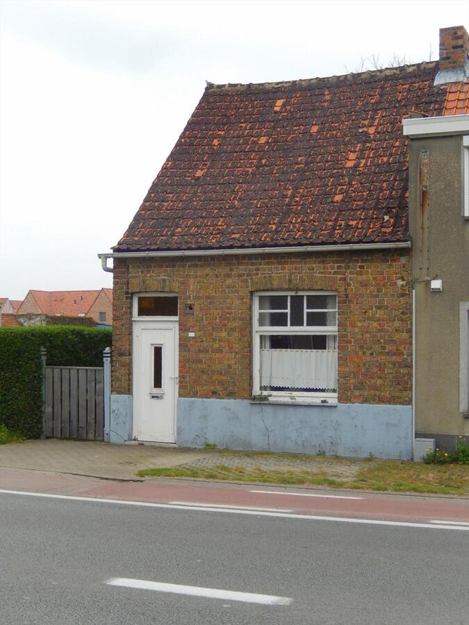 Mooi perceel bouwgrond met huis te Jabbeke 