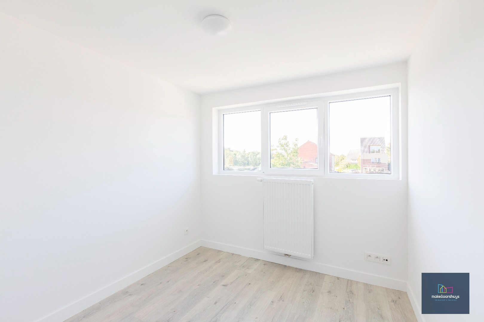 Instapklare energiezuinige woning met 3slpk tuin en staanplaats 