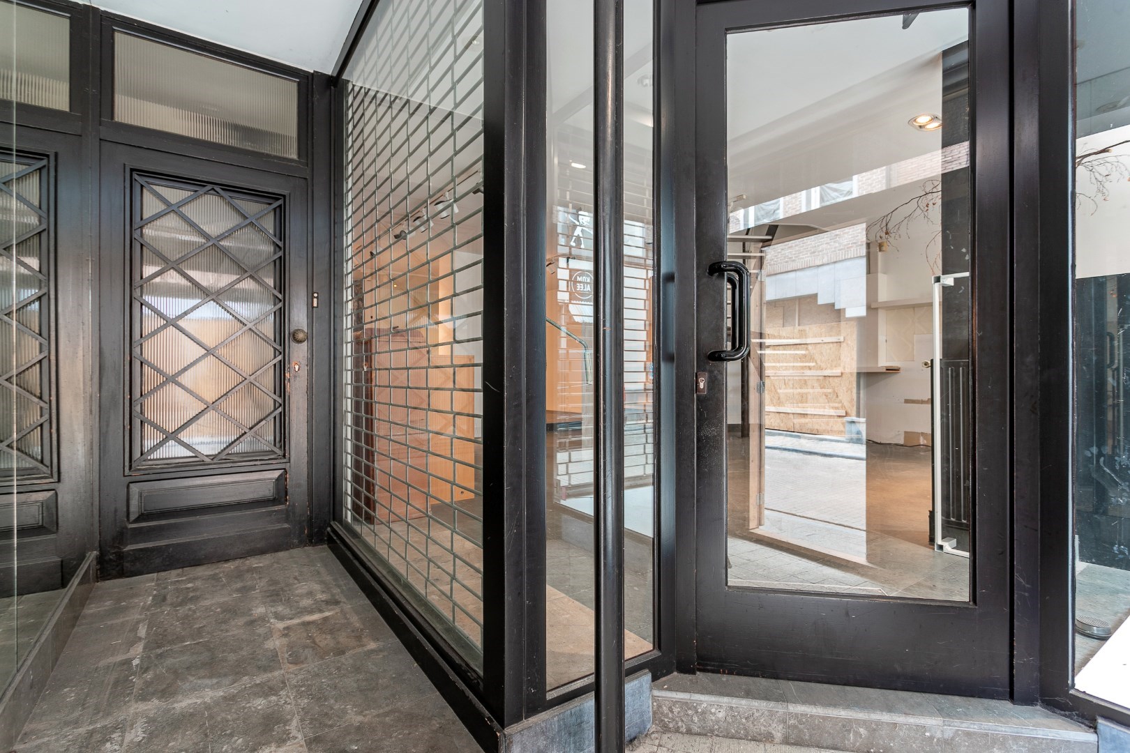 Handelshuis én appartement centrum Halle 