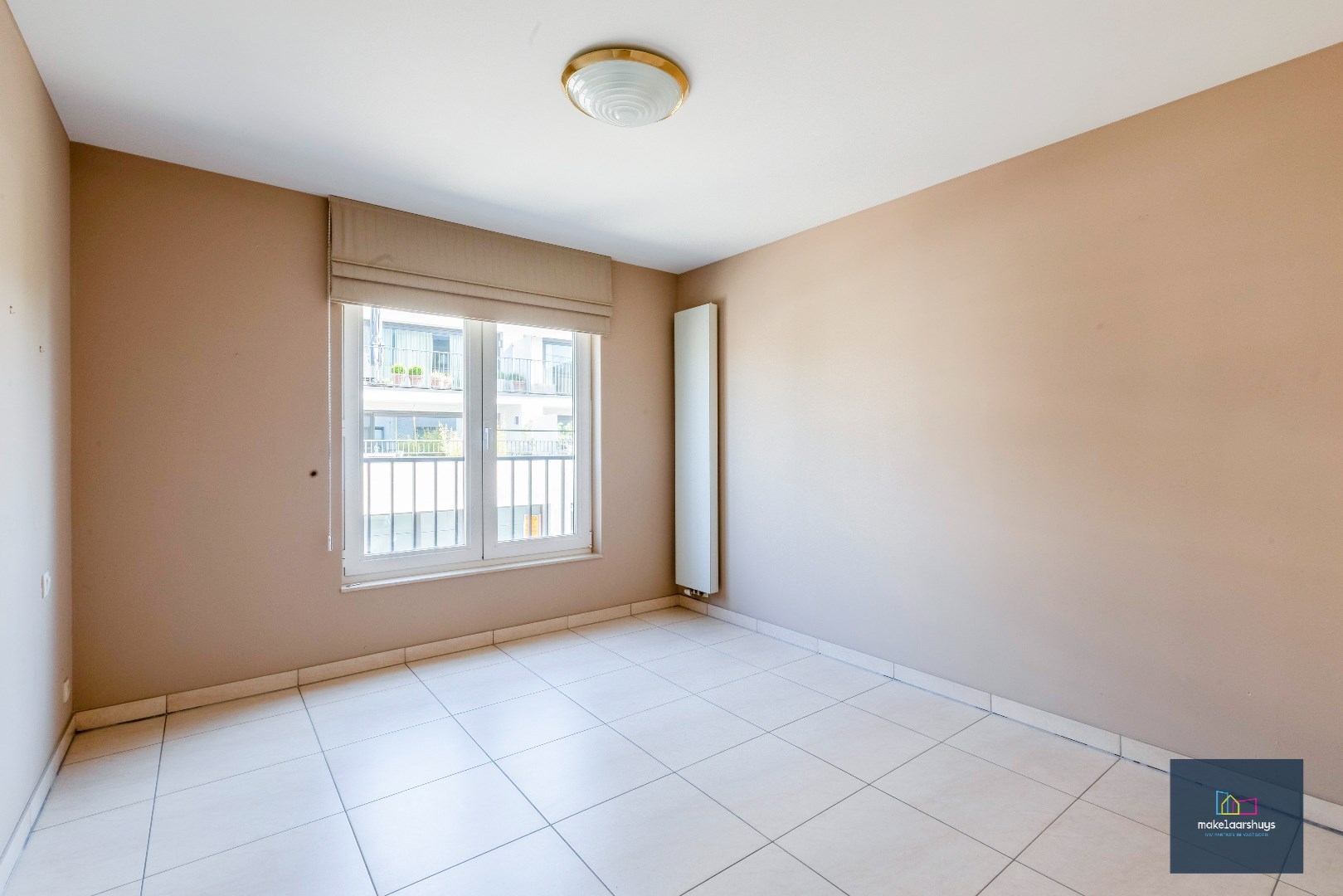 2-slpk app met terras, staanplaast en garagebox nabij centrum Merelbeke 