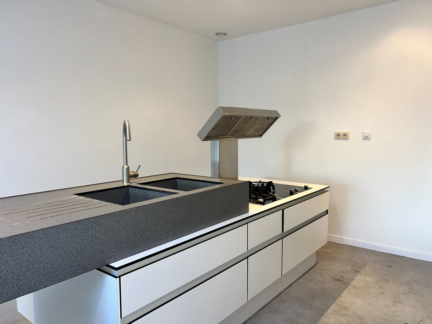 Verrassend ruime woning met 4 slaapkamers, garage en stadstuintje 