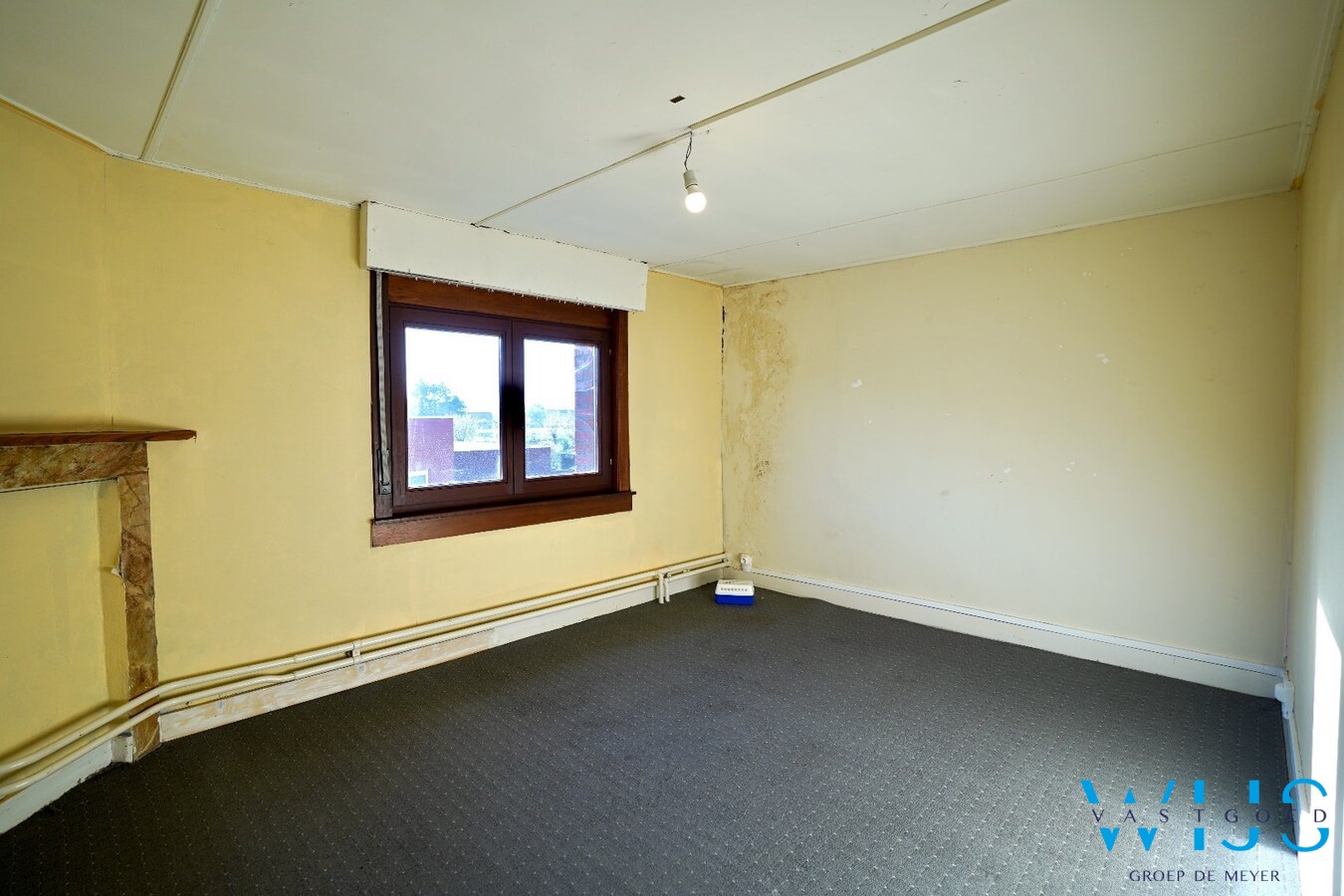 Interessant te renoveren woonhuis met 4.133 m² grond in het centrum van Wippelgem! 