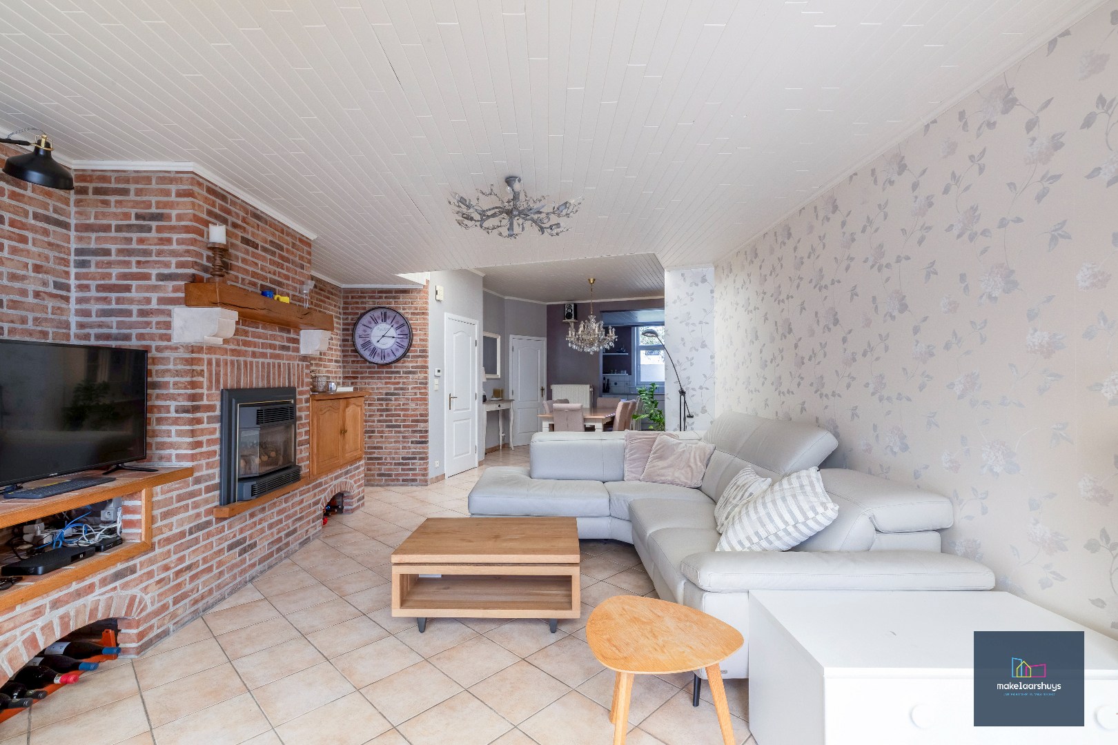 Goed onderhouden en ruime woning in rij met tuin/terras te Wondelgem 