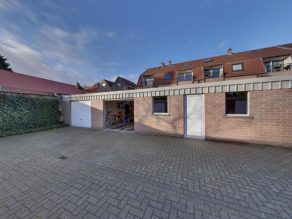 Gelijkvloers appartement met zuidgerichte tuin 