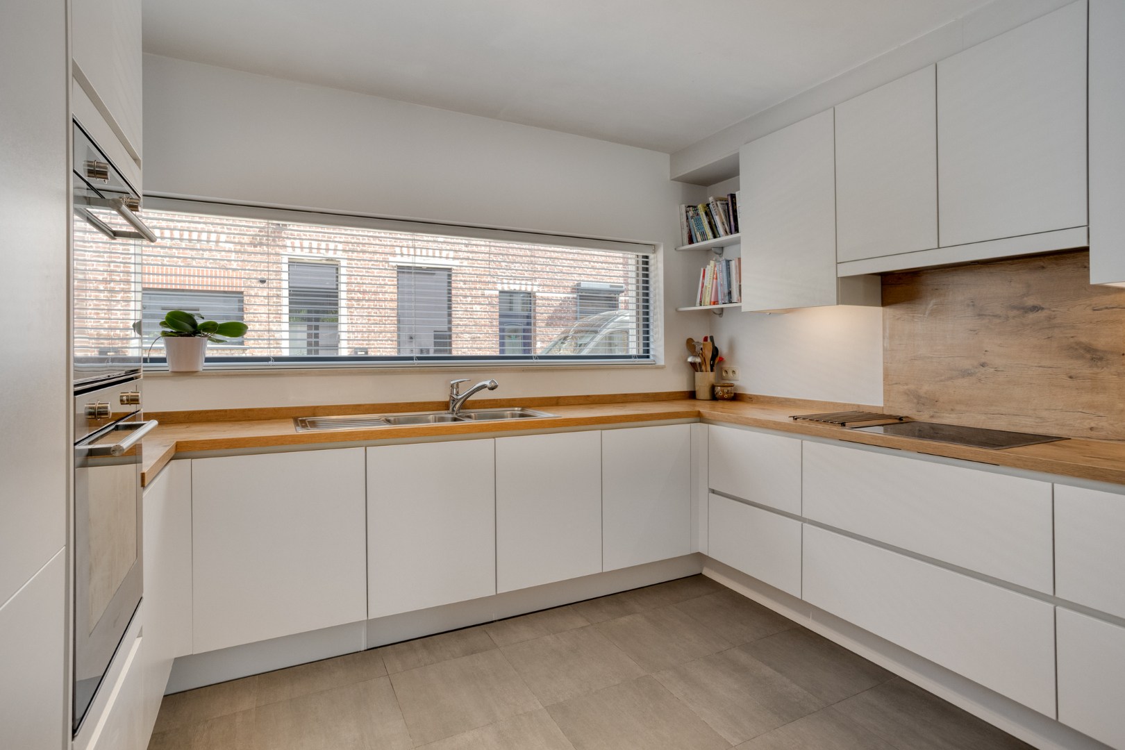 Instapklare woning met 4 slaapkamers, aangename leefruimte met staanplaats - EPC 89Kw/m² 