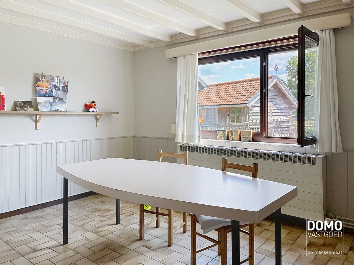 Gerenoveerde open bebouwing met tuin gelegen te Hasselt 