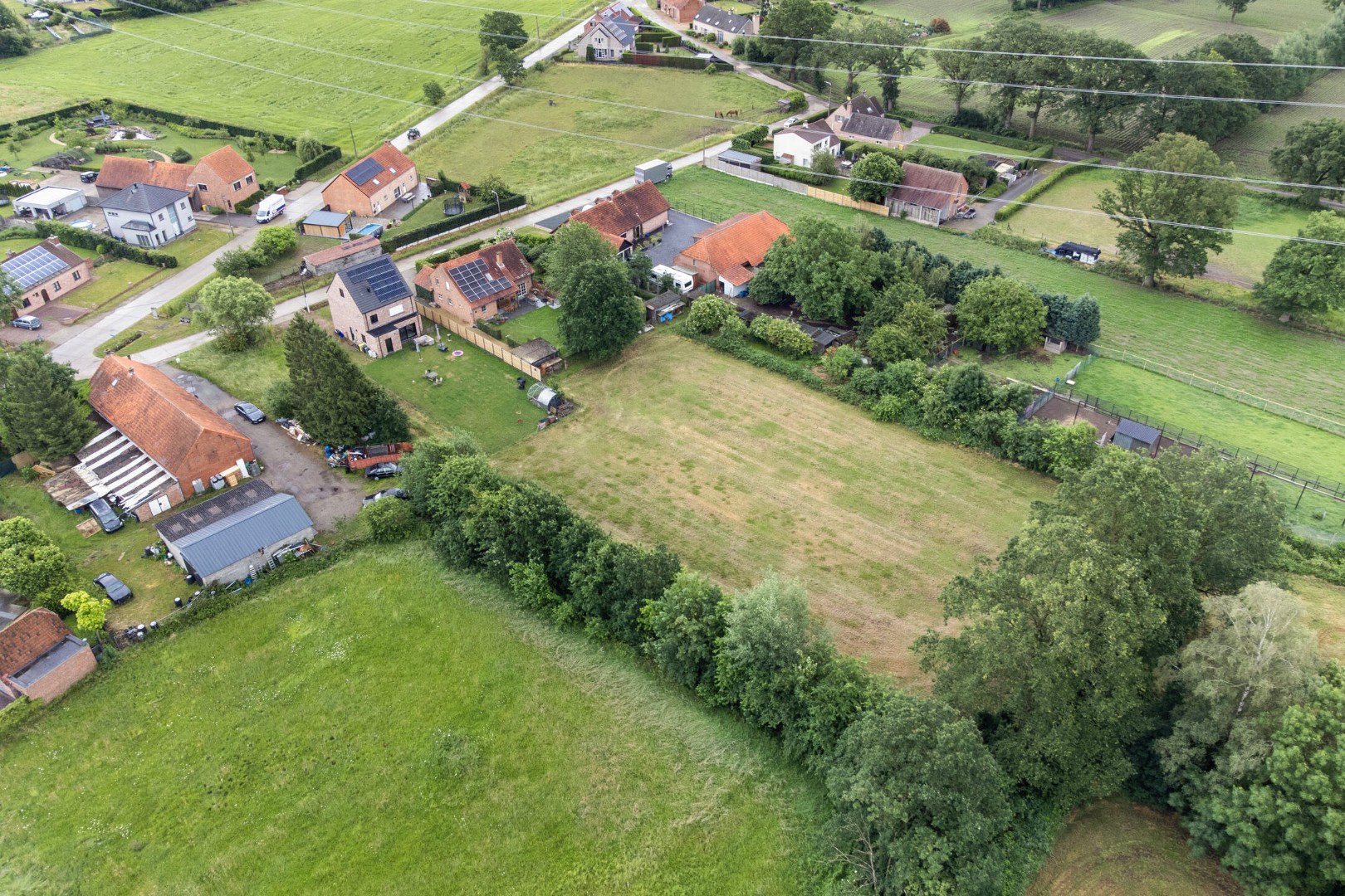 Bouwgrond voor open bebouwing met achterliggend weiland op 4.581 m² in Olmen 