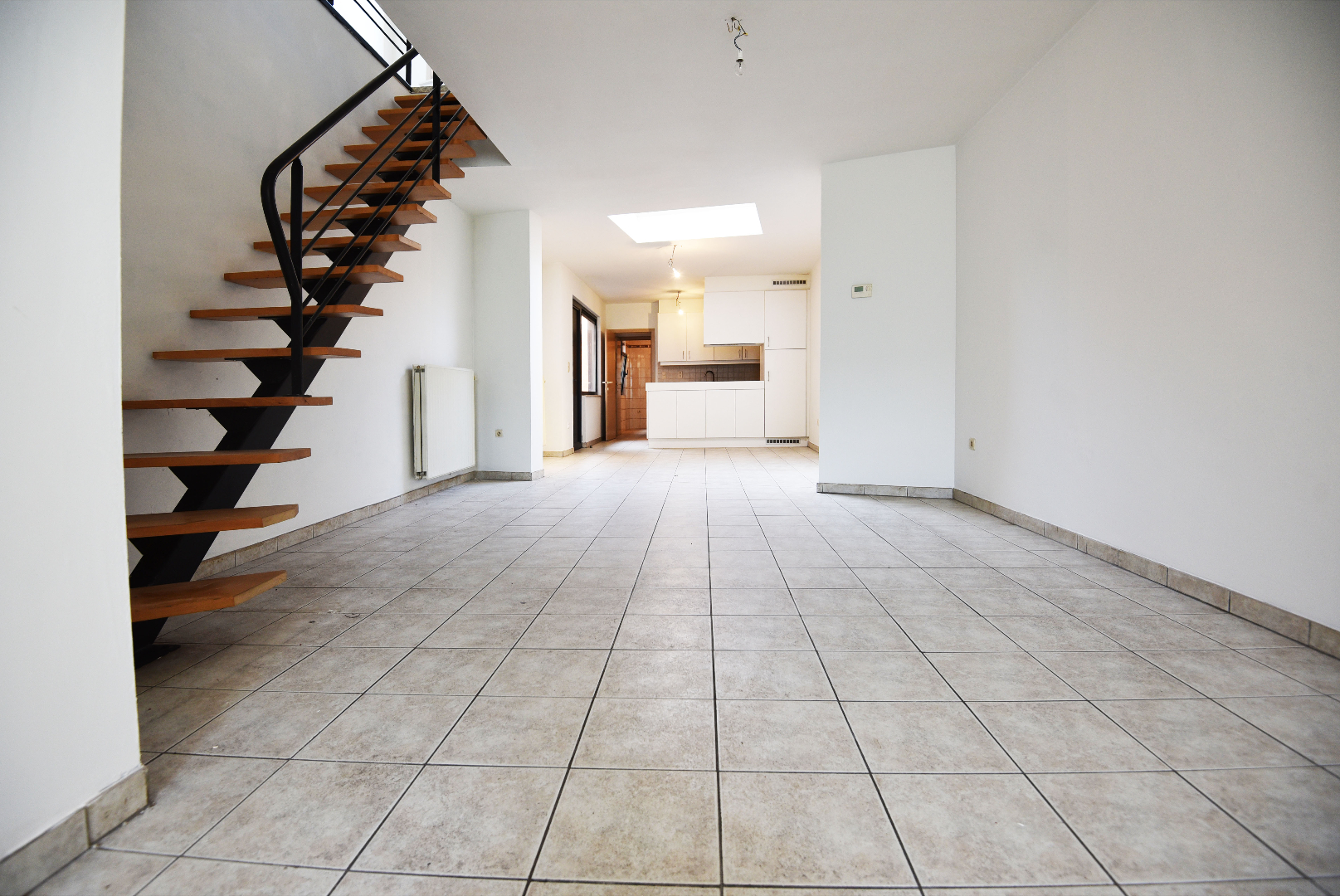 Rijwoning met 2 slpks en tuin te Eeklo 