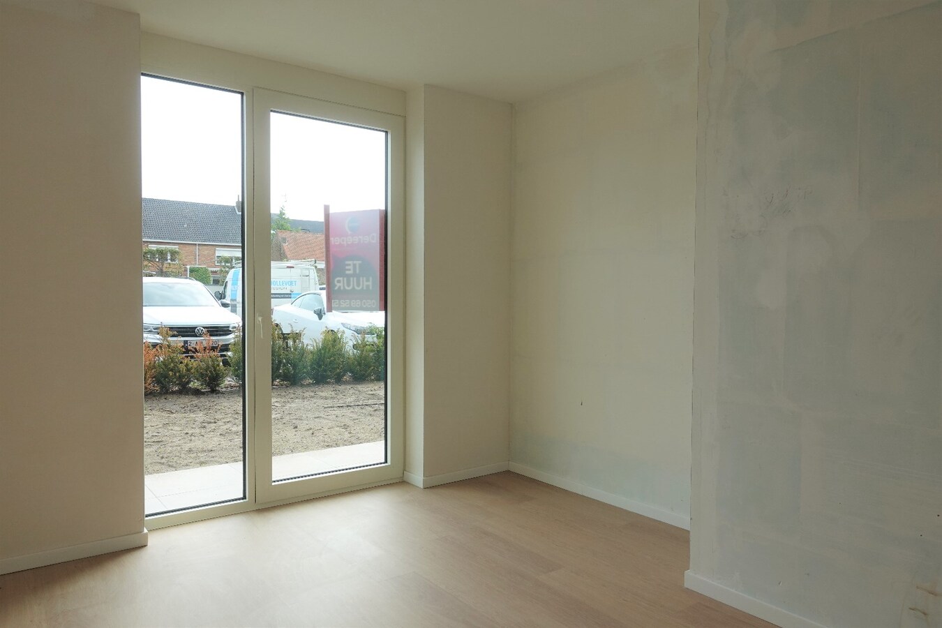 Nieuwbouwappartement met terras en tuin 