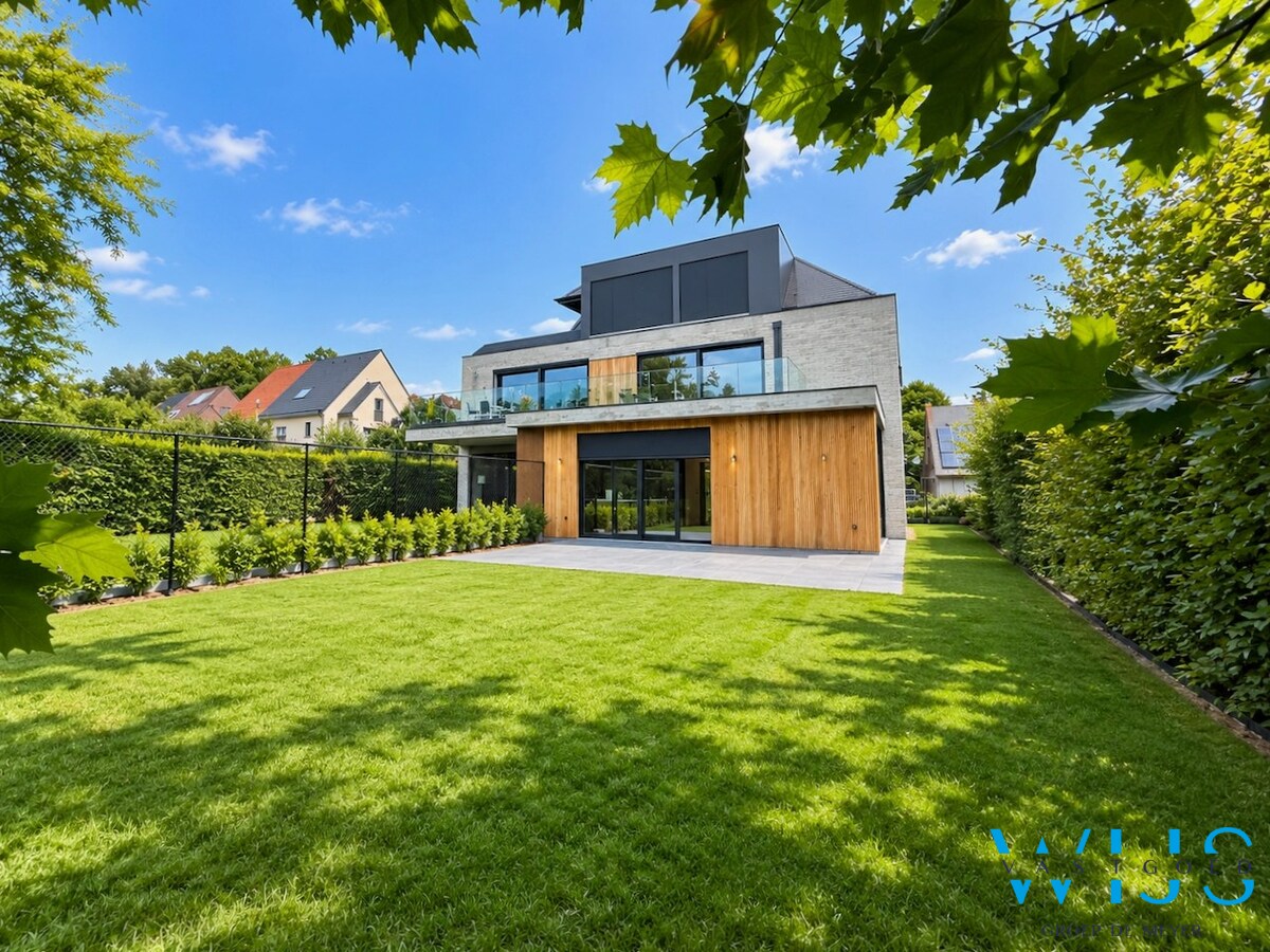 High-end gelijkvloers appartement met tuin te Lembeke ! 