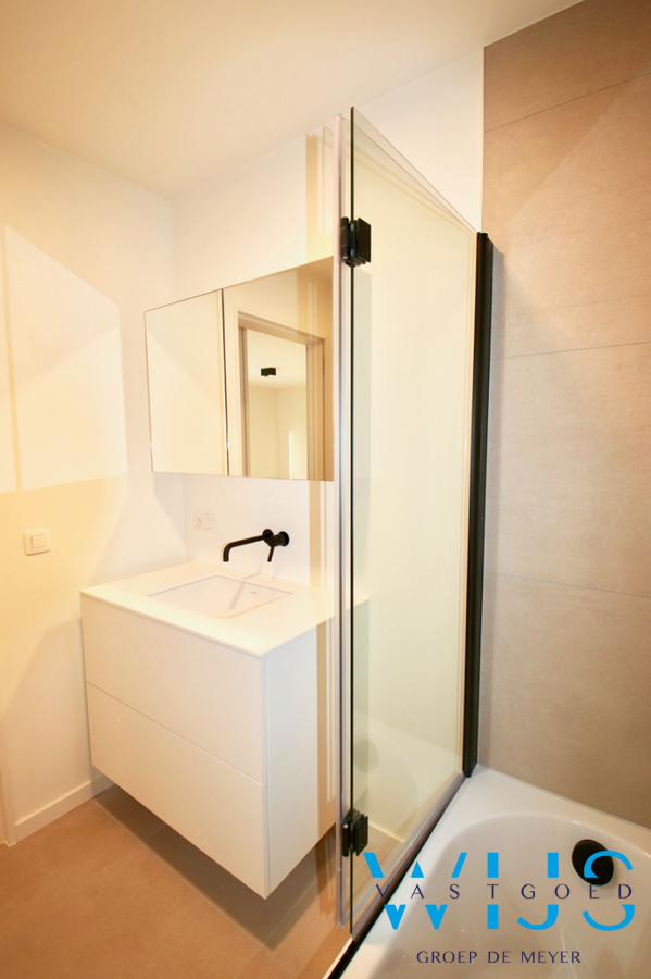 Zeer aangenaam gelijkvloers appartement met tuin te Belzele ! 