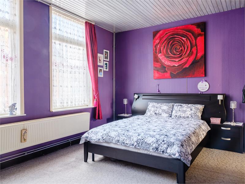 Rijwoning met 4 slaapkamers en ruim terras 