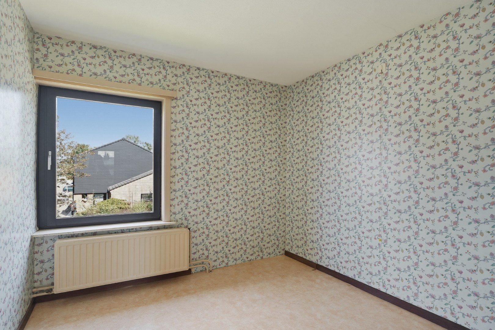 Renovatiewoning met 3 slpks, garage en zonnige tuin 