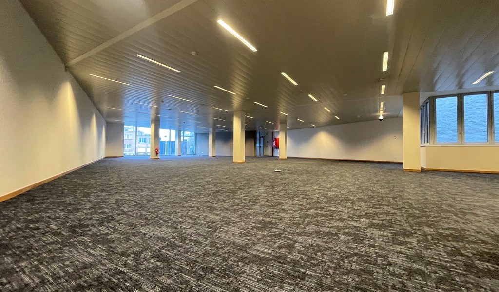 Gerenoveerde kantoren in geklasseerde herenwoning te huur aan station van Mechelen