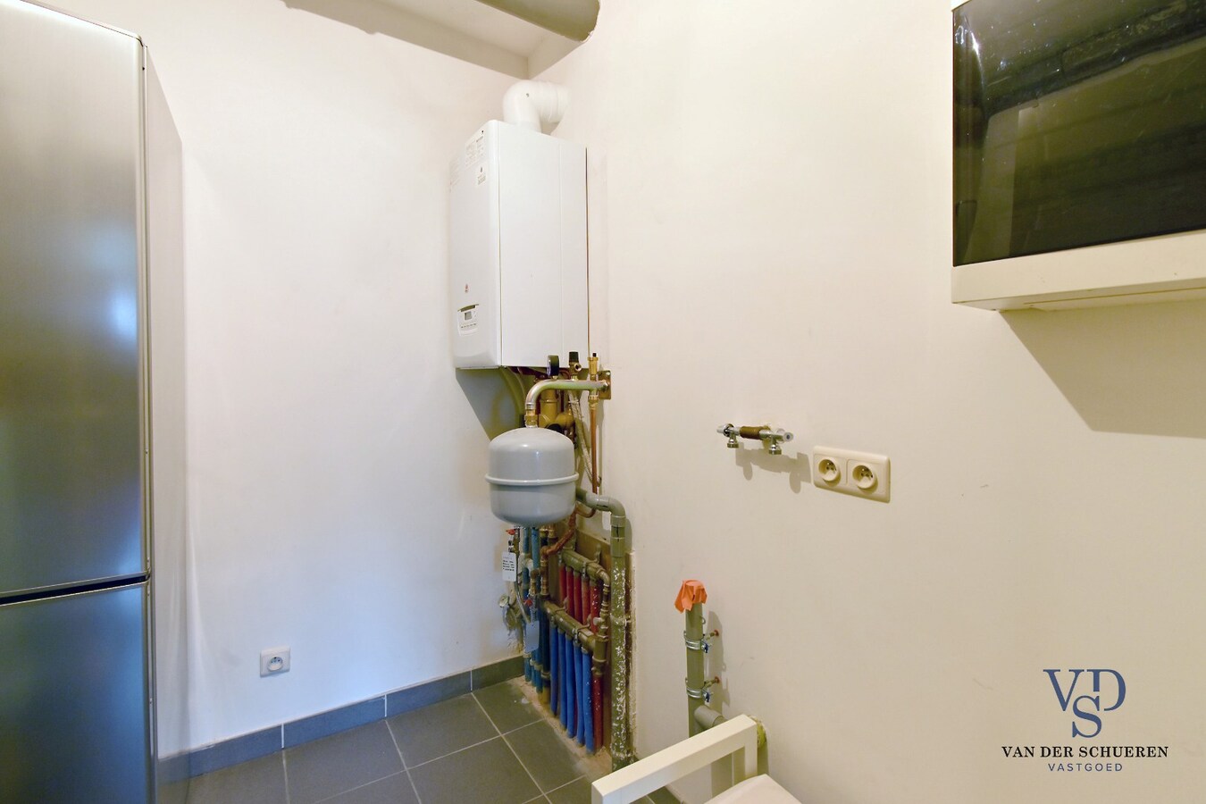 Ruim appartement in hartje Zingem. 