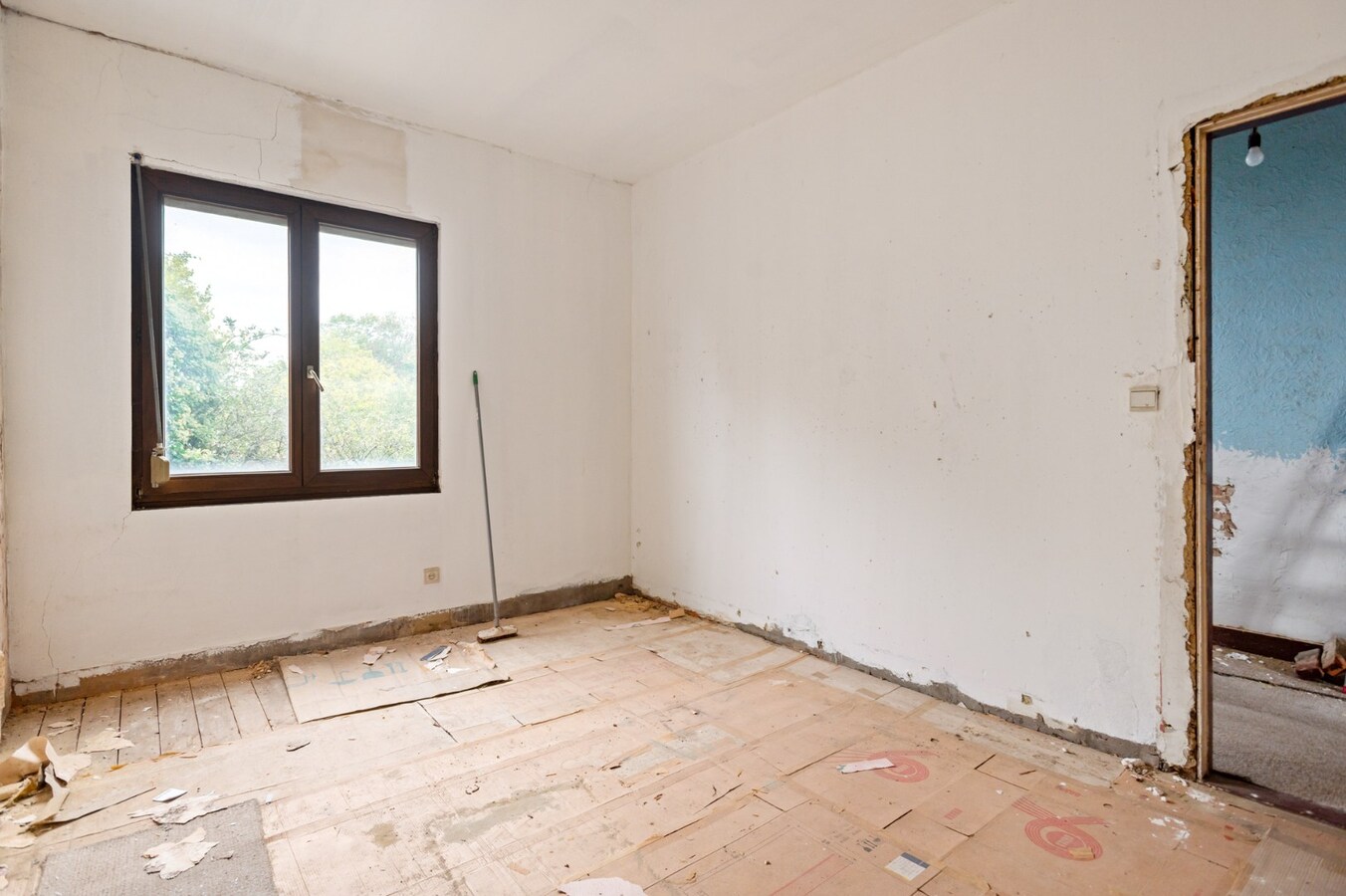 Te renoveren woning met 3 slpk en tuin te Boom! 