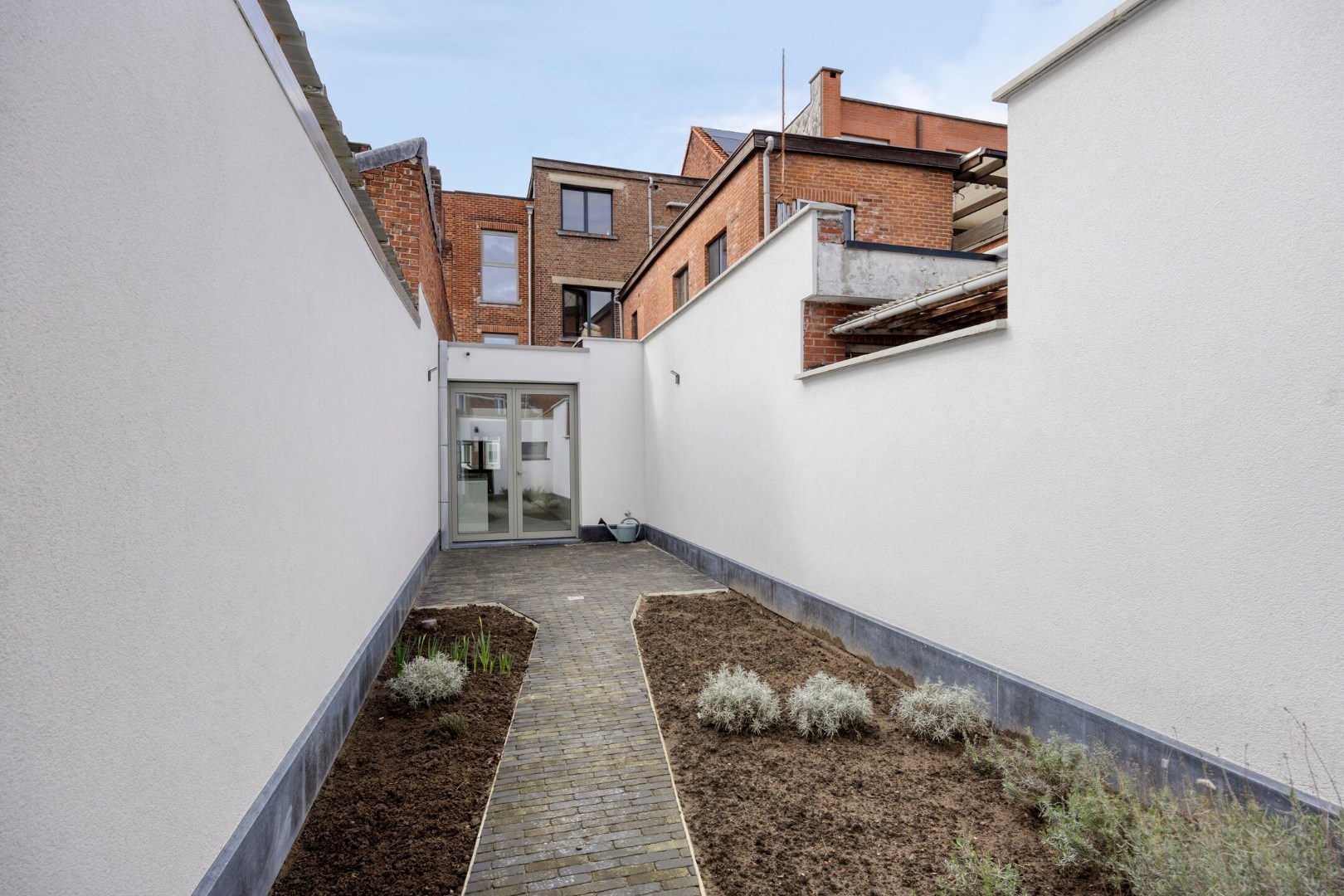 Parel met garage en stadstuin te huur in het centrum van Geel 