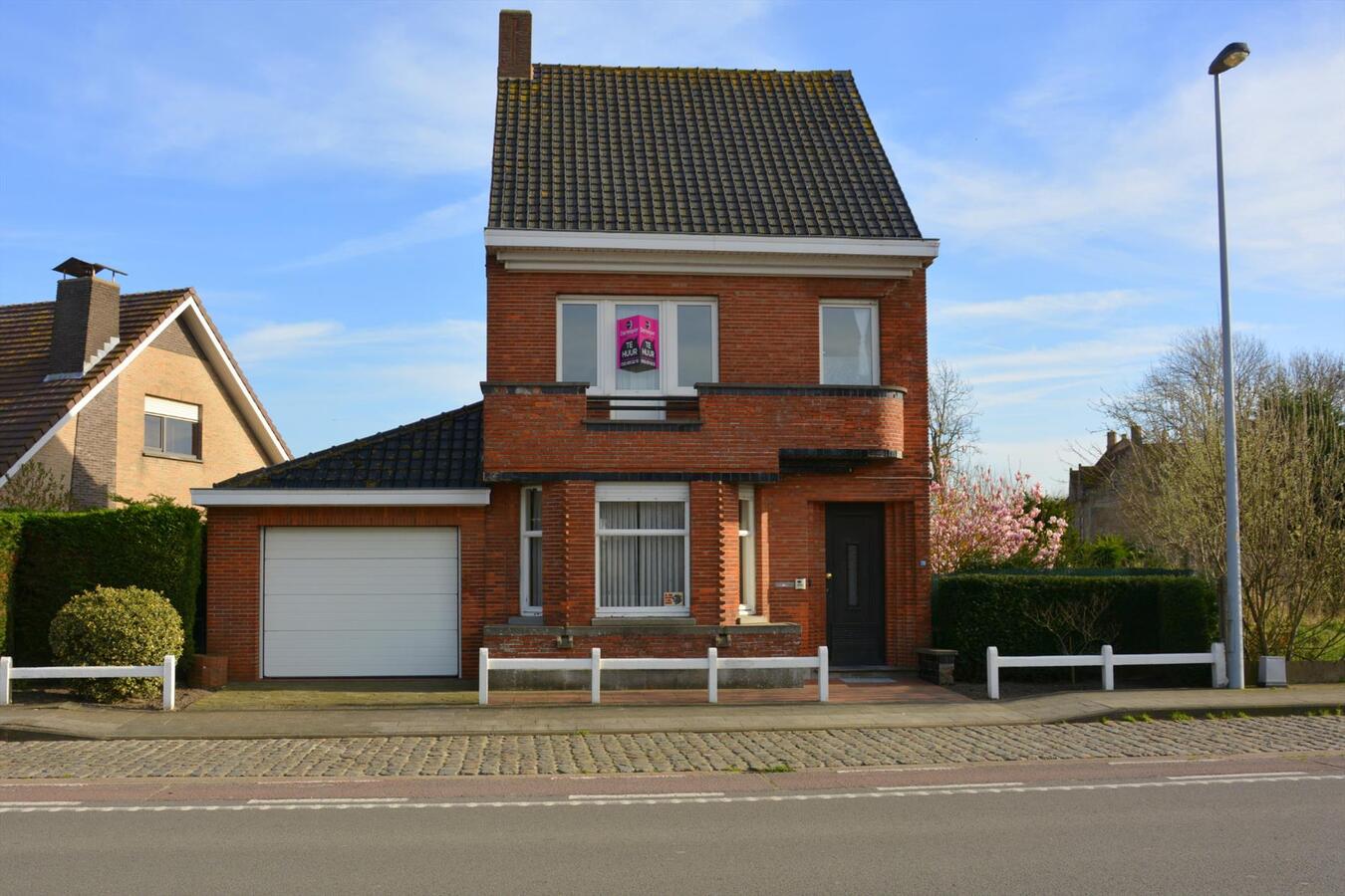 Woning met zonnige tuin en garage 