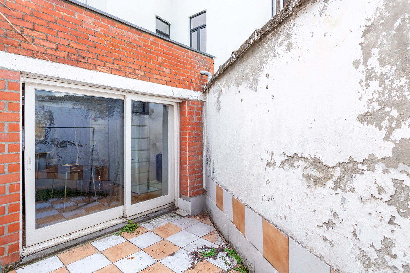 Unieke renovatiewoning met karakter en potentieel in hartje Ledeberg 