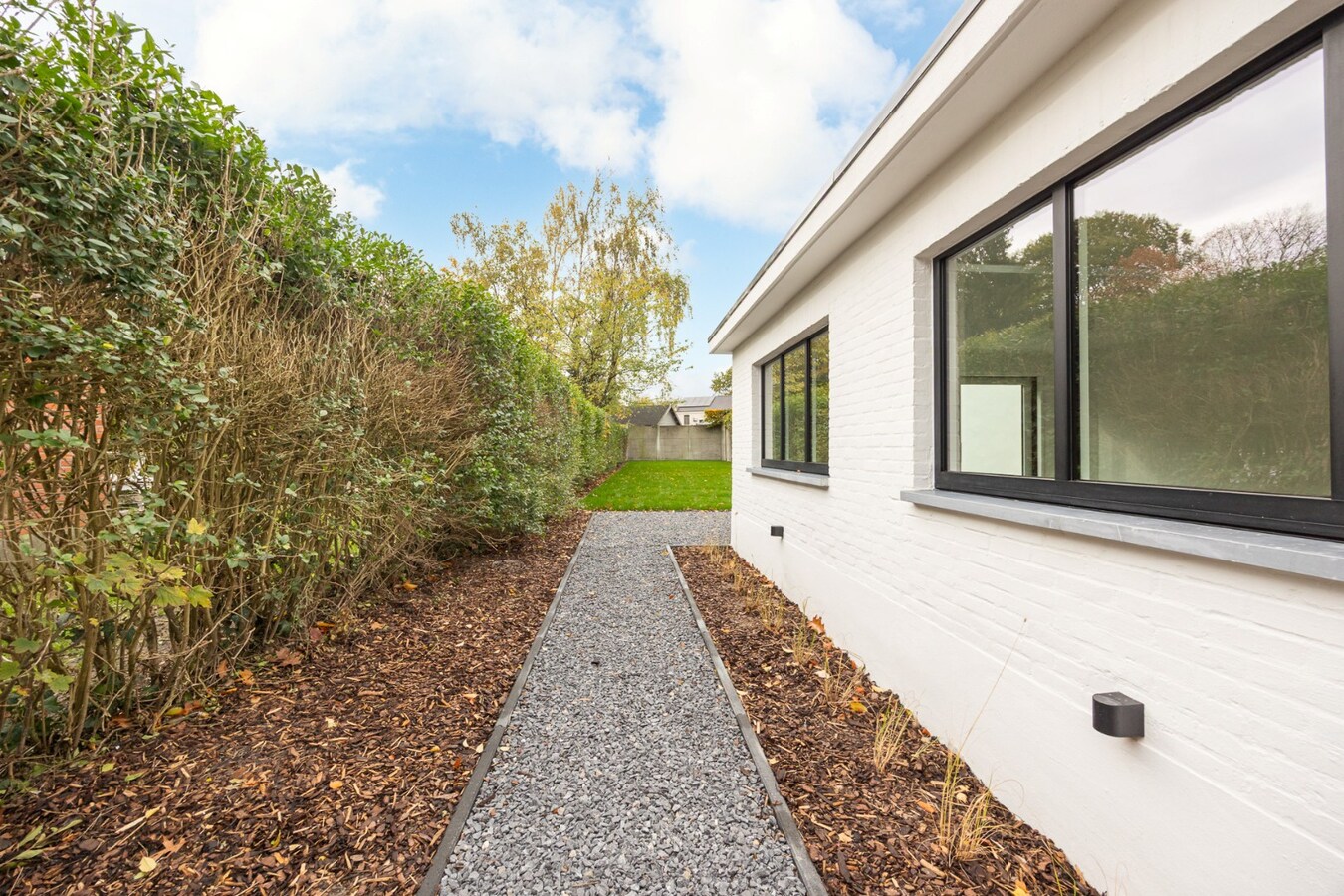 Energiezuinige instapklare woning met 4 slaapkamers en bijgebouw in hartje Schilde 