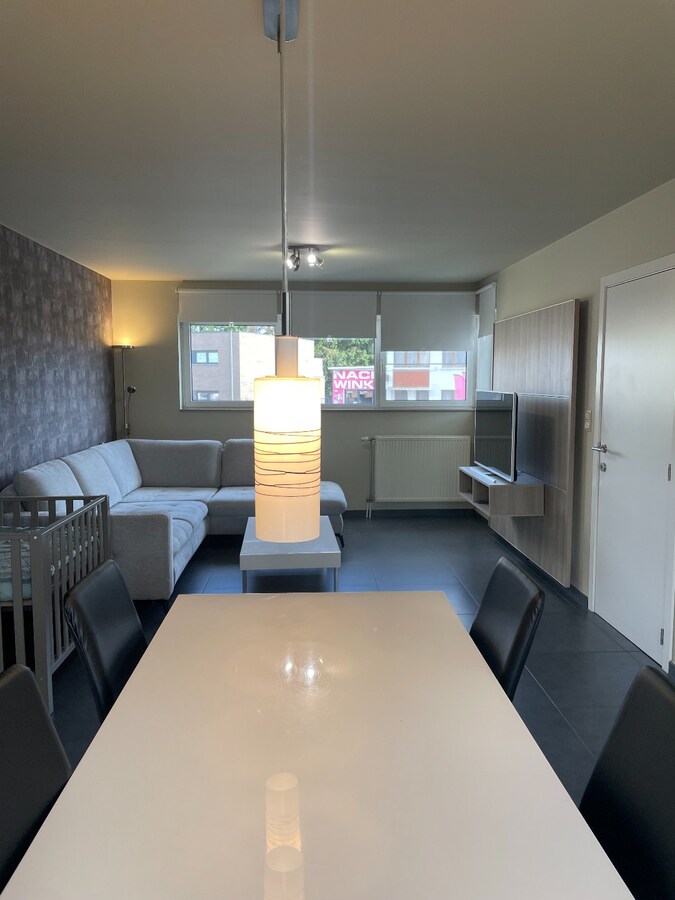 Verzorgde bel-etagewoning met 3 slpk, terras, patio  en garage nabij het centrum van As. 