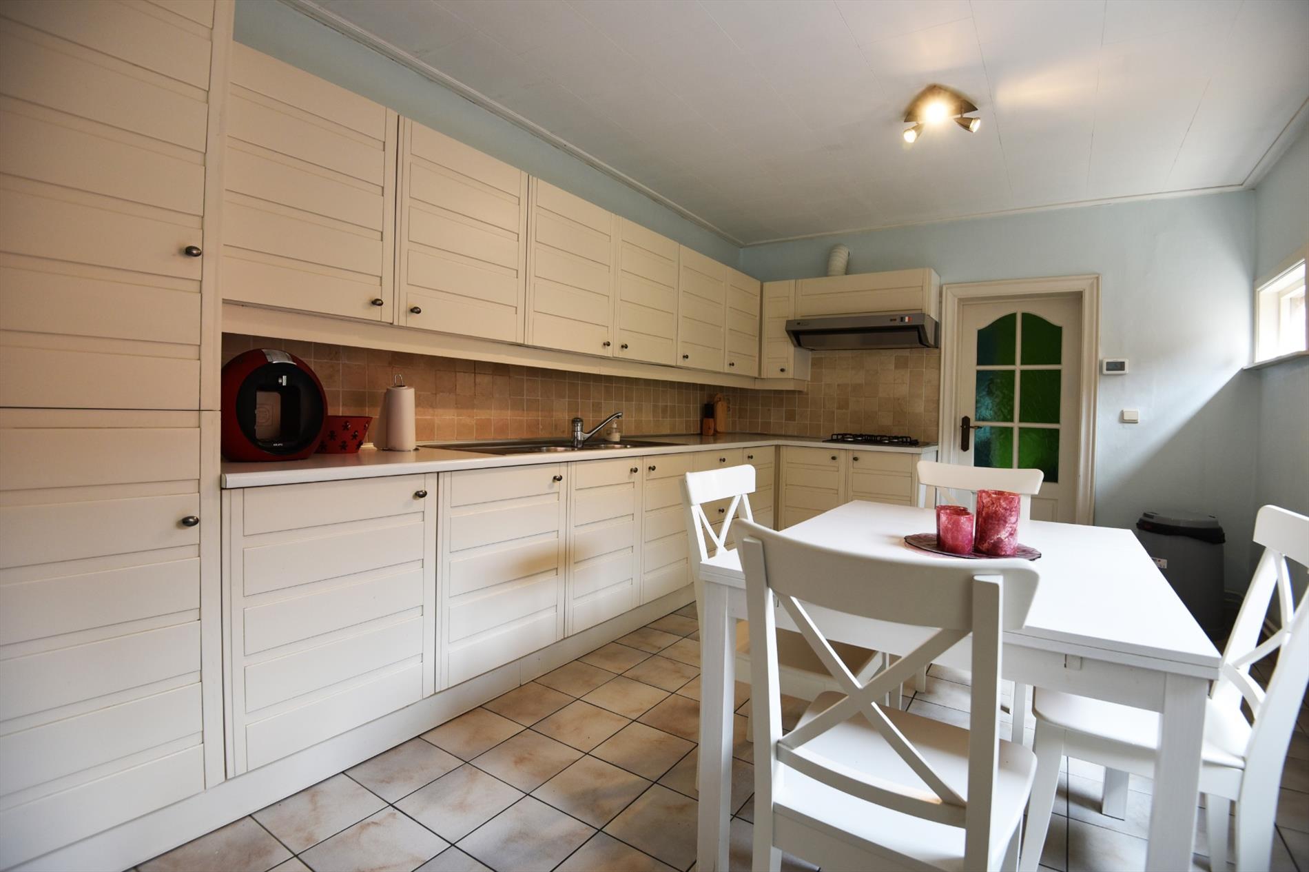 Gezinswoning met 2 slpks (mogelijkheid 3), garage en tuin nabij centrum Maldegem 